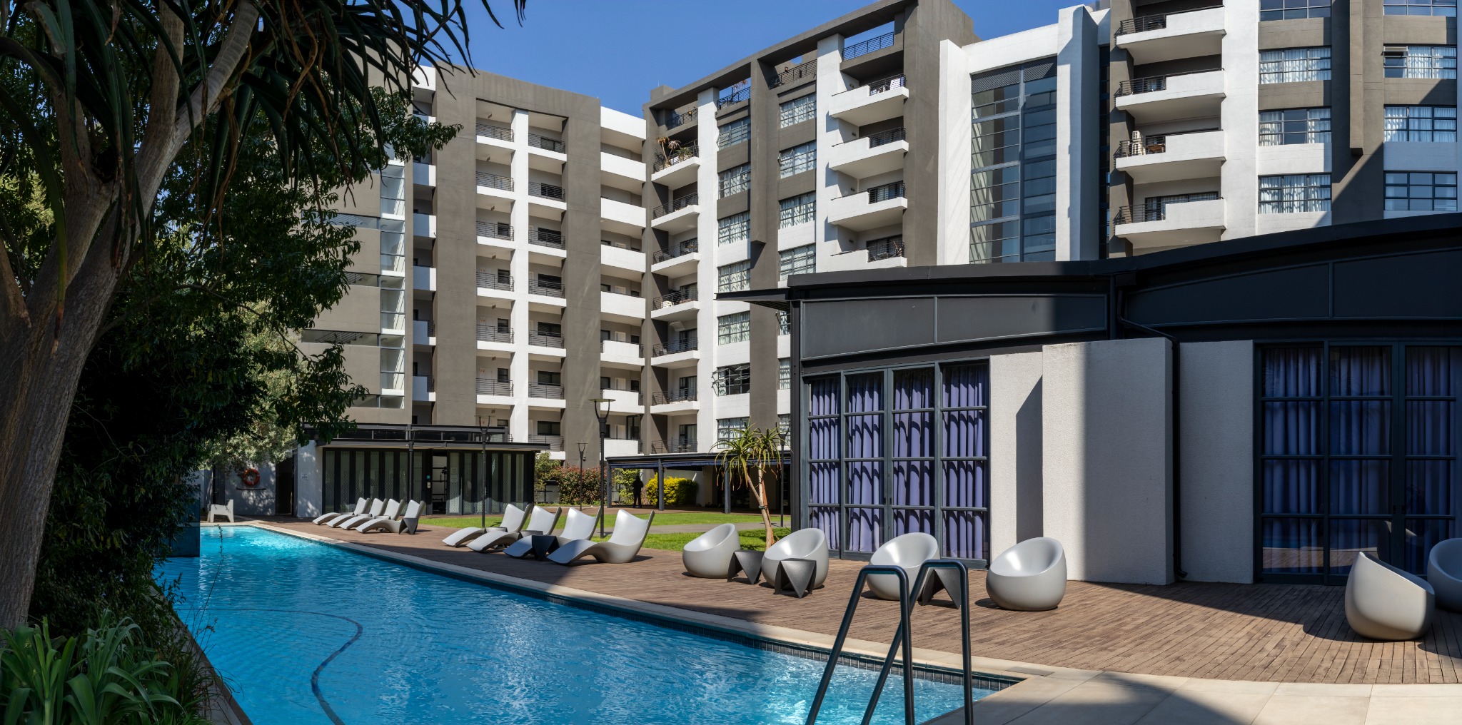 Pool courtyard and apartment exterior