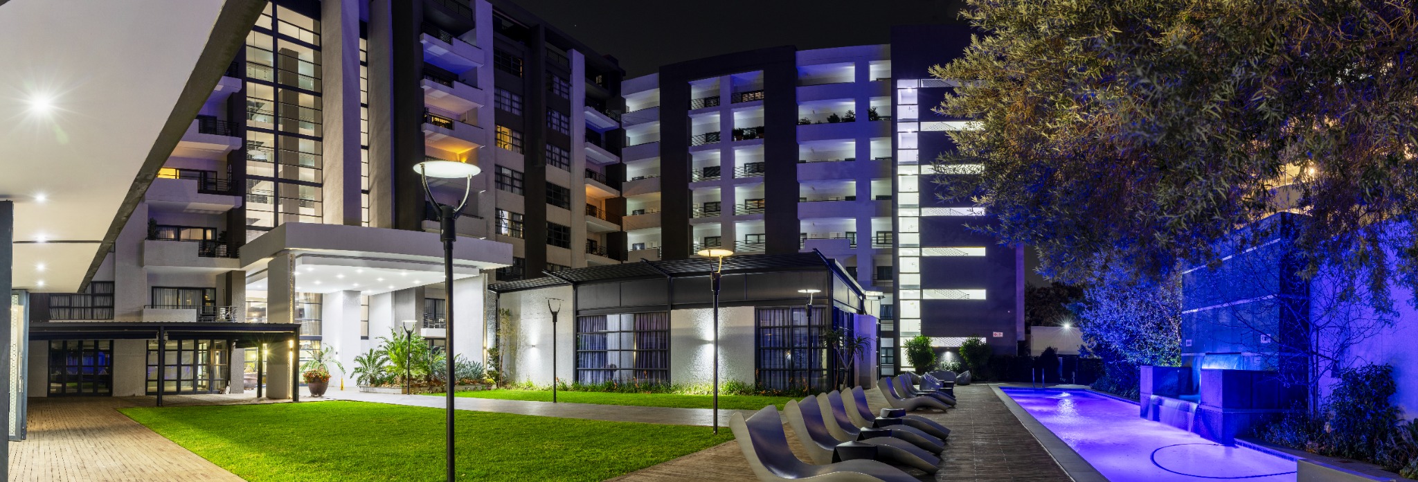 Night-time residence and pool deck