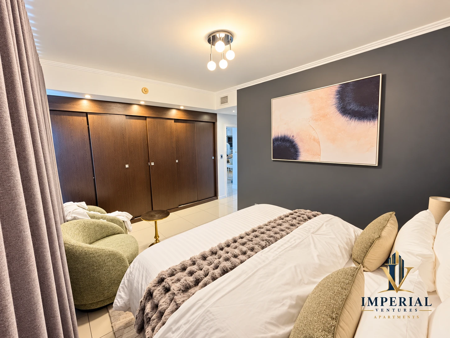 Furnished bedroom with built-in wardrobes